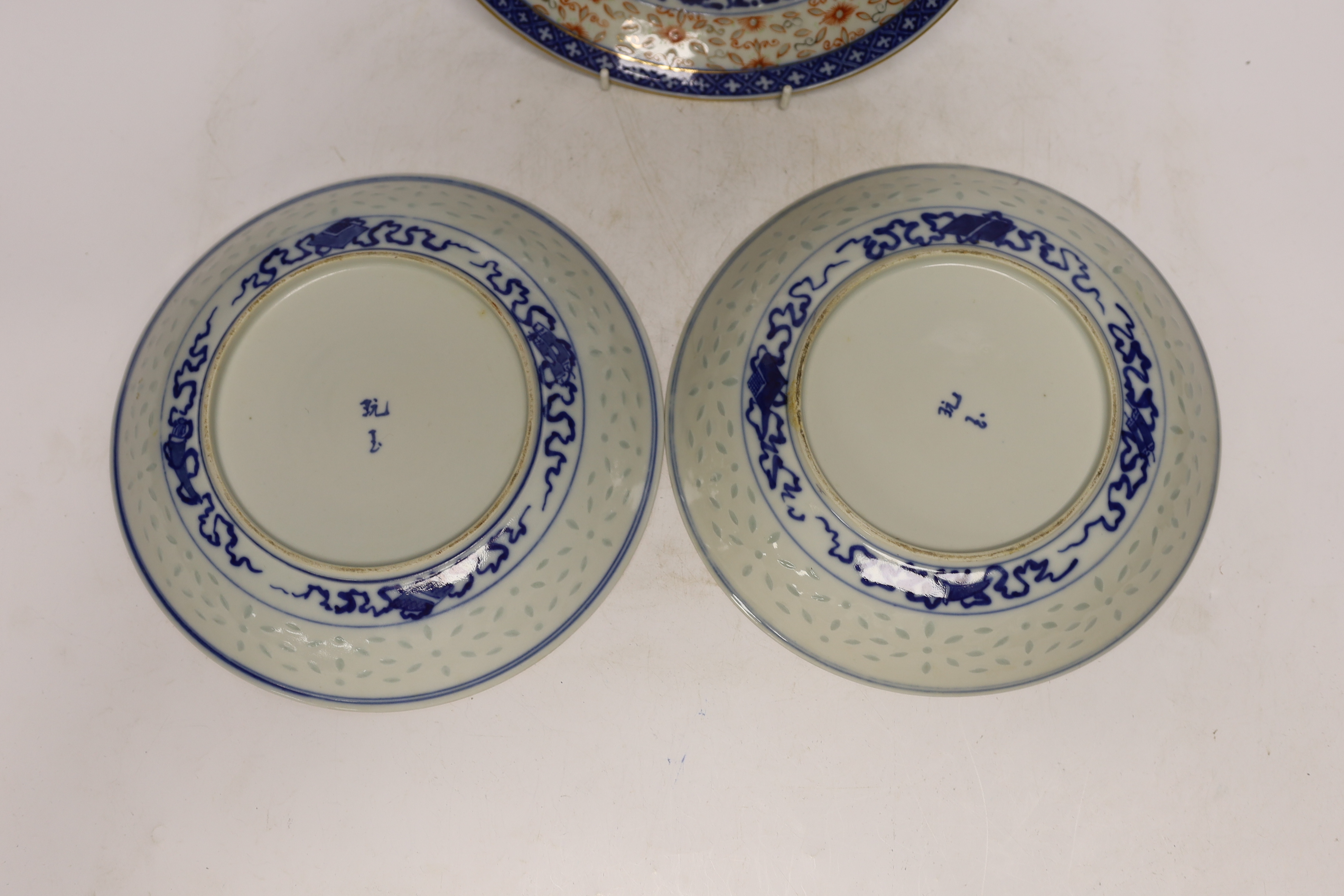 Three Chinese blue and white ‘dragon’ dishes, 24cm diameter
